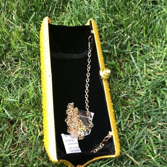 Yellow Rhinestone long clutch. With rhinestone enclosure and long chain